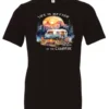black campfire t-shirt featuring a camper by the lake, campfire on, and mountains with a sunset in the background, and it says life is better at the campfire.
