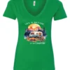 green campfire v-neck t-shirt featuring a camper by the lake, campfire on, and mountains with a sunset in the background, and it says life is better at the campfire.