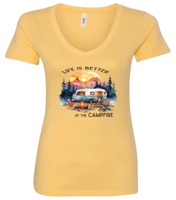 yellow campfire v-neck t-shirt featuring a camper by the lake, campfire on, and mountains with a sunset in the background, and it says life is better at the campfire.