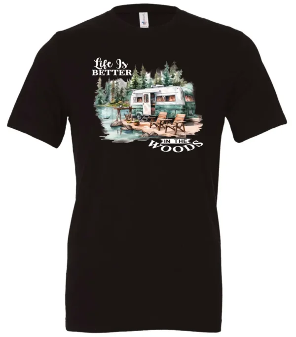 black Camping graphic t-shirt featuring a white and red old camper set up by the lake in the woods, and it says life is better in the woods