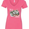 pink Camping graphic v-neck t-shirt featuring a white and red old camper set up by the lake in the woods, and it says life is better in the woods