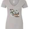 silver Camping graphic v-neck t-shirt featuring a white and red old camper set up by the lake in the woods, and it says life is better in the woods