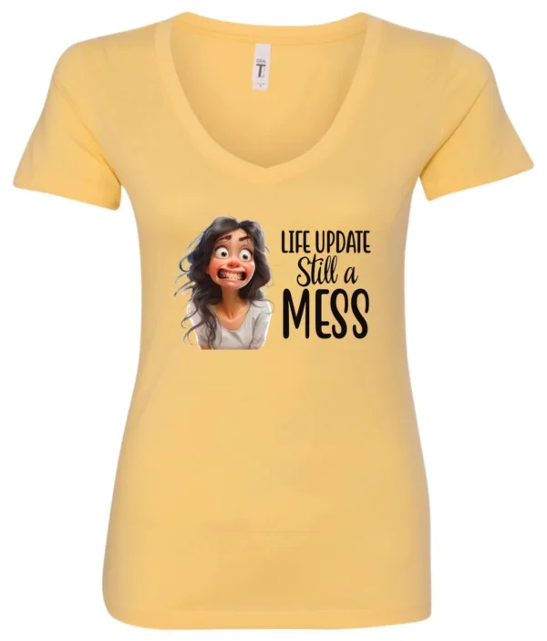 yellow funny saying v-neck t-shirt featuring a young girl with long brown hair, with an embarrassed face saying life update, still a mess
