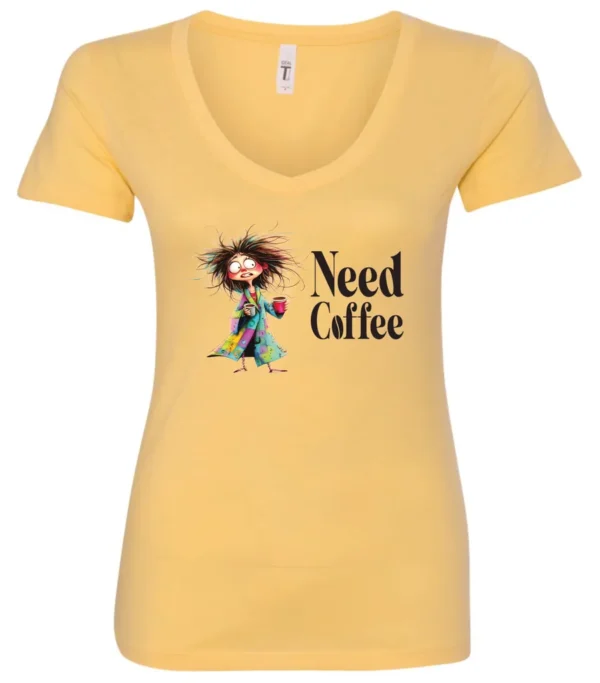 yellow funny coffee lover v-neck t-shirt featuring a disheveled young woman in pajamas with two cups of coffee it says need coffee