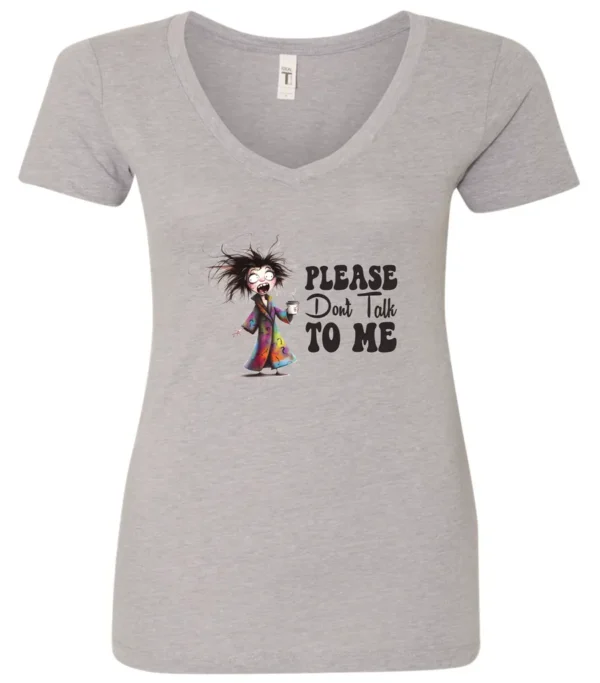 silver funny sarcasm v-neck t-shirt featuring a woman who has just woken up in pajamas, disheveled, with a cup of coffee in her hand and screaming please don’t talk to me