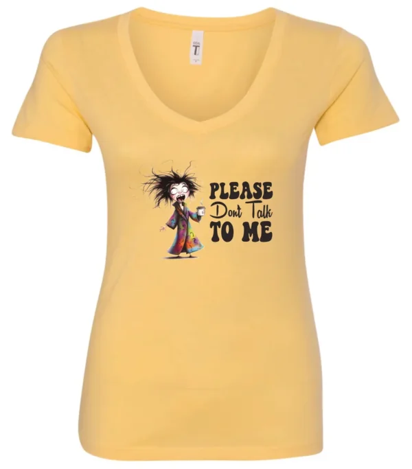 yellow funny sarcasm v-neck t-shirt featuring a woman who has just woken up in pajamas, disheveled, with a cup of coffee in her hand and screaming please don’t talk to me