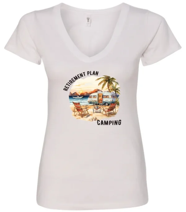 white funny Camping v-neck t-shirt featuring a camper set up by the beach with the mountain as background, and it says retirement plan: camping