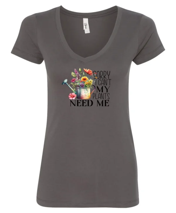 gray garden humor v-neck t-shirt with a watering can used as a flower pot, it has many different flowers and a quote saying sorry i can't, my plants need me