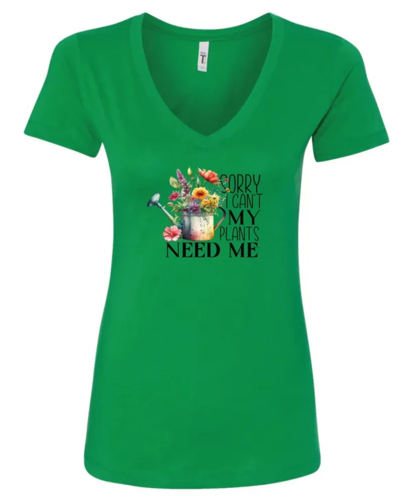 green garden humor v-neck t-shirt with a watering can used as a flower pot, it has many different flowers and a quote saying sorry i can't, my plants need me