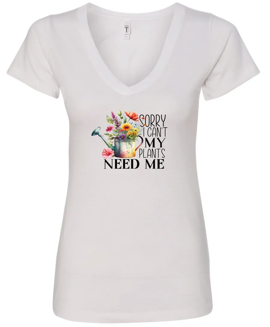 white garden humor v-neck t-shirt with a watering can used as a flower pot, it has many different flowers and a quote saying sorry i can't, my plants need me