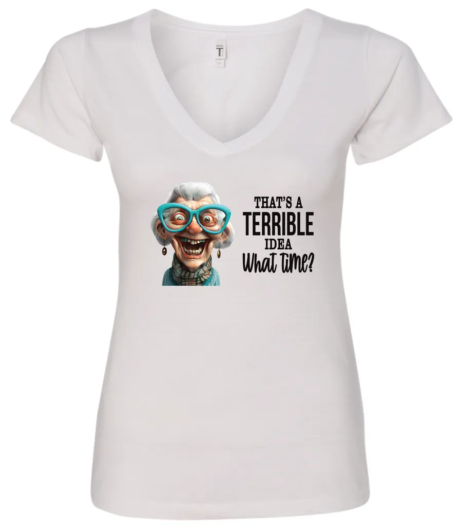 white funny sarcastic v-neck t-shirt featuring a very happy, smiling old woman with white hair and big blue glasses, saying that’s a terrible idea, what time?