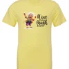 yellow funny wine t-shirt featuring an old woman laughing with white hair glasses and two glasses of wine, with the quote wine a little, laugh a lot