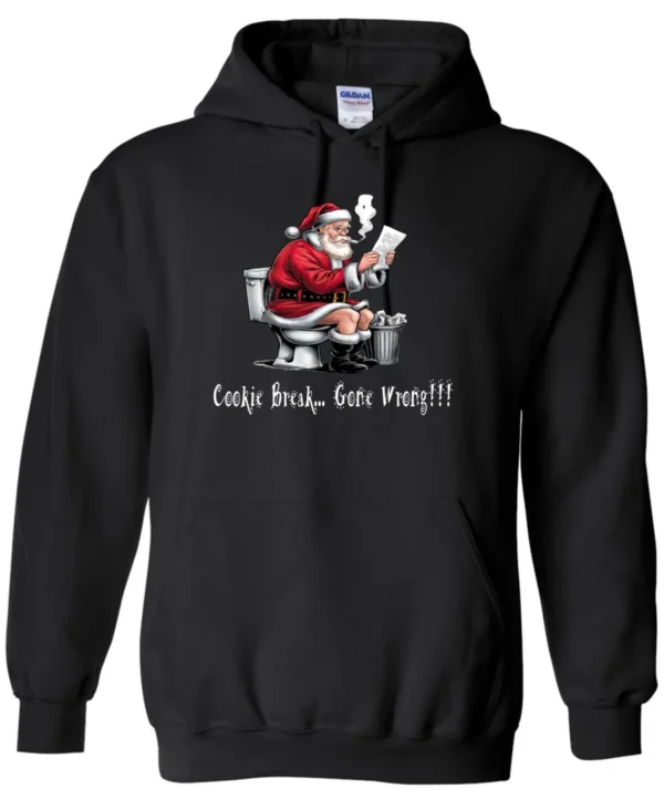 black Christmas humor hoodie featuring santa claus sitting on the toilet, reading the newspaper and smoking a cigarette, and it says cookie break gone wrong