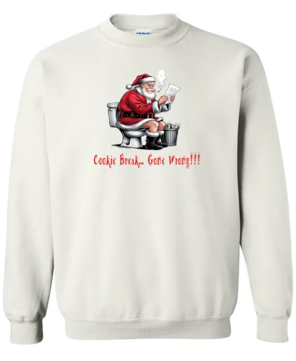 white Christmas humor sweatshirt featuring santa claus sitting on the toilet, reading the newspaper and smoking a cigarette, and it says cookie break gone wrong