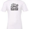 white t-shirt with a chameleon on a tree branch saying my attention changes colors
