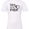 white t-shirt featuring a toilet paper saying they see me rollin