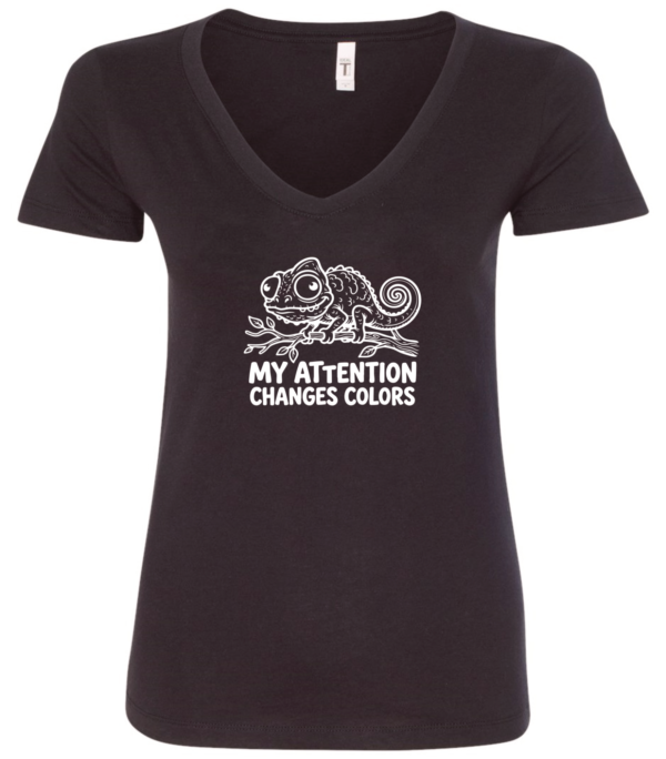 black v-neck t-shirt with a chameleon on a tree branch saying my attention changes colors