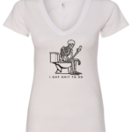 white v-neck t-shirt saying i got shit to do featuring a skeleton seated in the toilet watching the cell phone