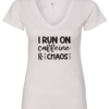 white v-neck t-shirt saying i run on caffeine and chaos