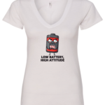 white v-neck t-shirt with a battery icon with a mad face saying low battery high attitude